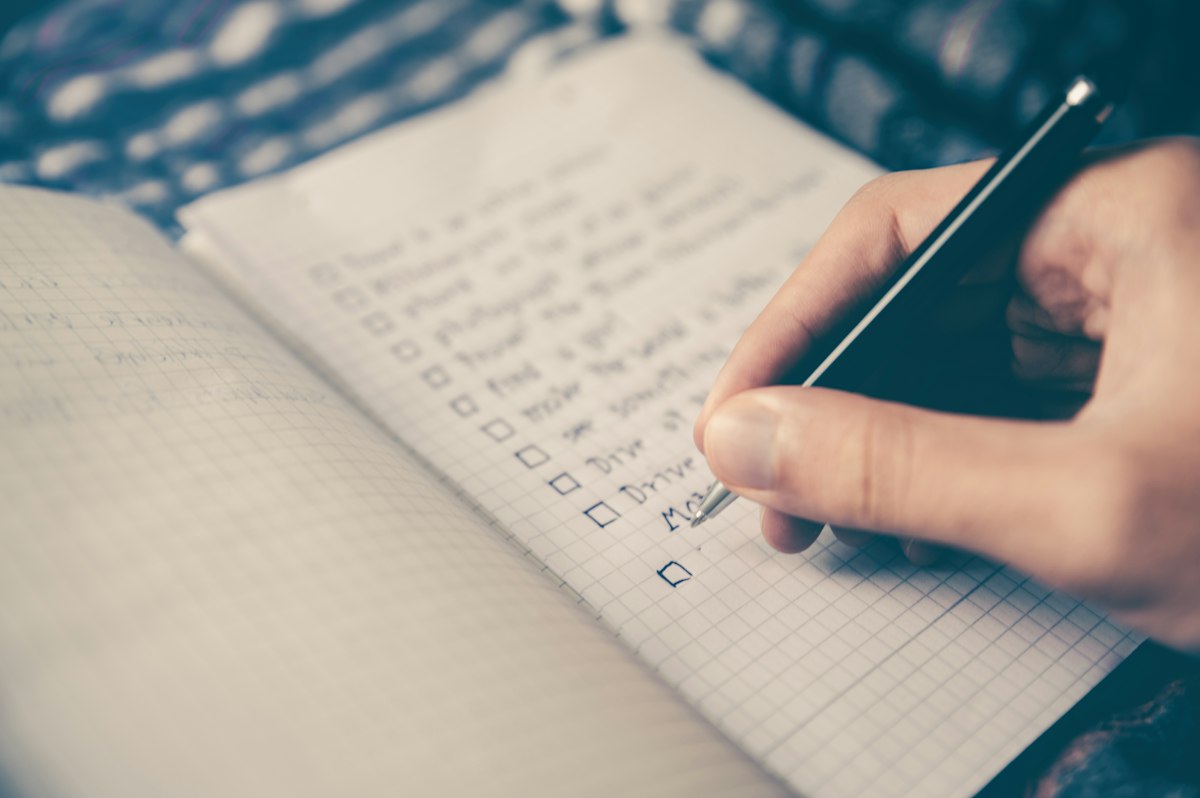 Handwritten milestone notes beside a calendar